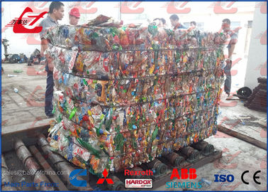 125 톤 플라스틱 병 및 판지를 위한 수평한 포장기 낭비 애완 동물 병 짐짝으로 만들 기계
